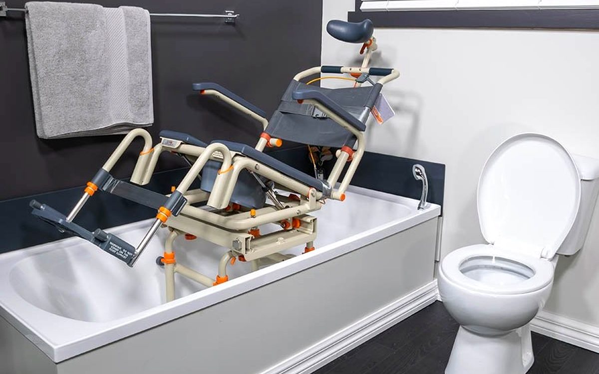 Showerbuddy tilt shower commode over a bath