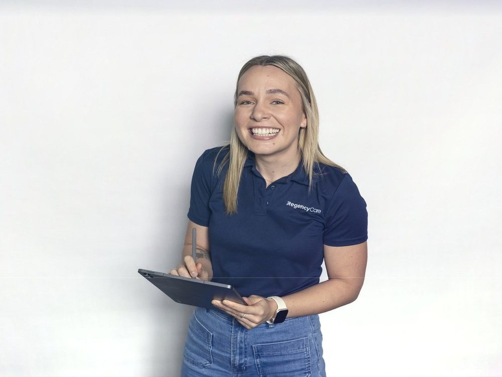 Smiling Regency Care team member ready to help